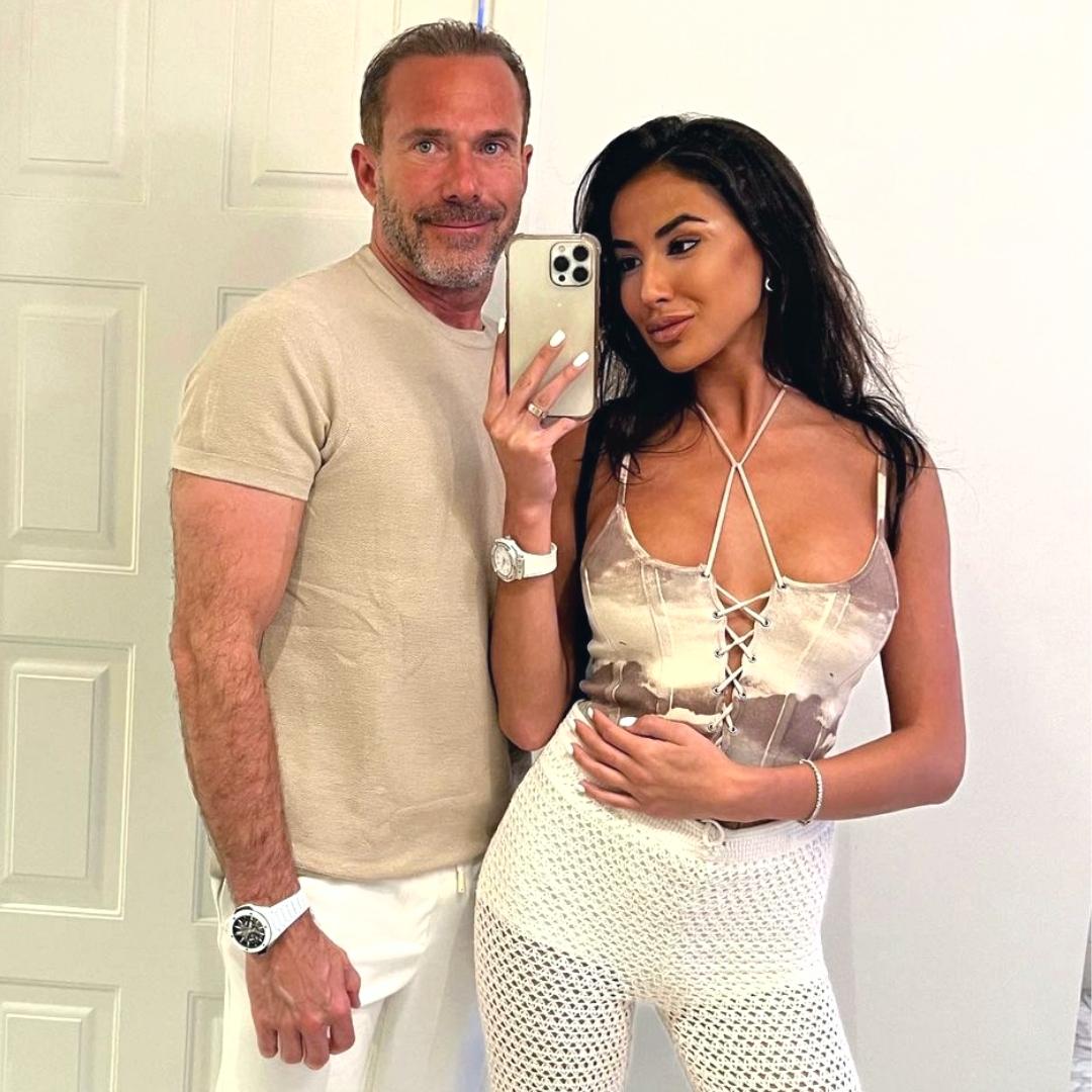 sugar baby taking selfie with sugar daddy in Michigan