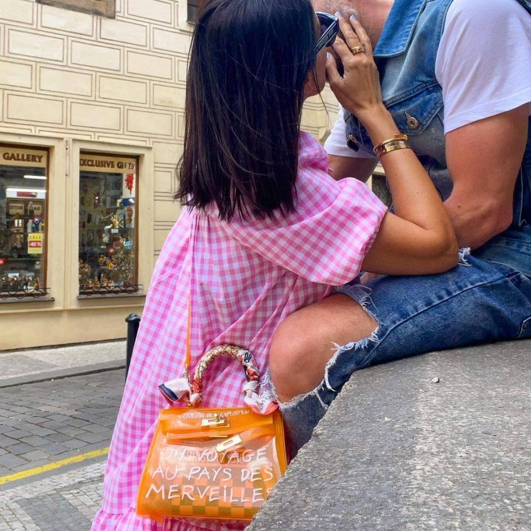 sugar daddy kissing sugar baby