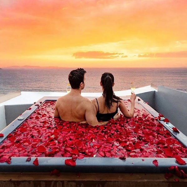 sugar daddy enjoys sunset with sugar baby