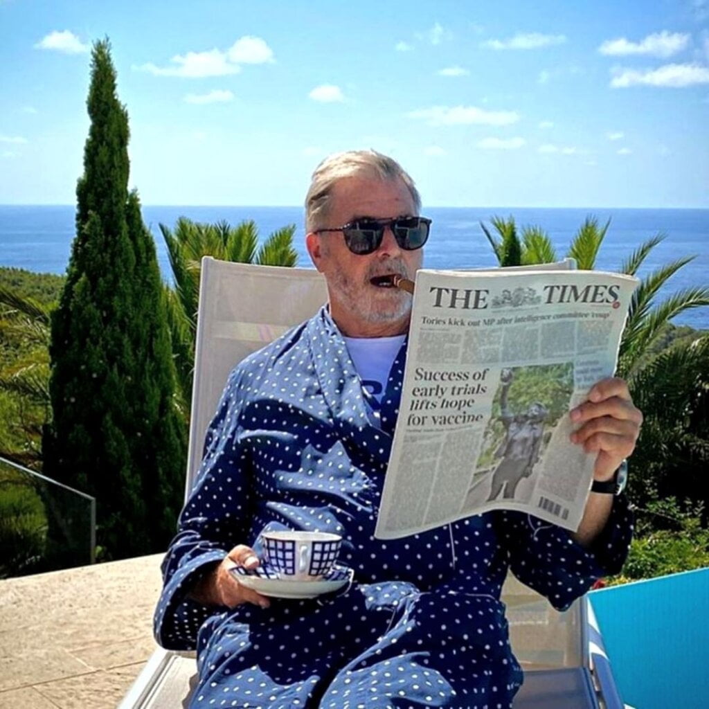 sugar daddy reading newspaper